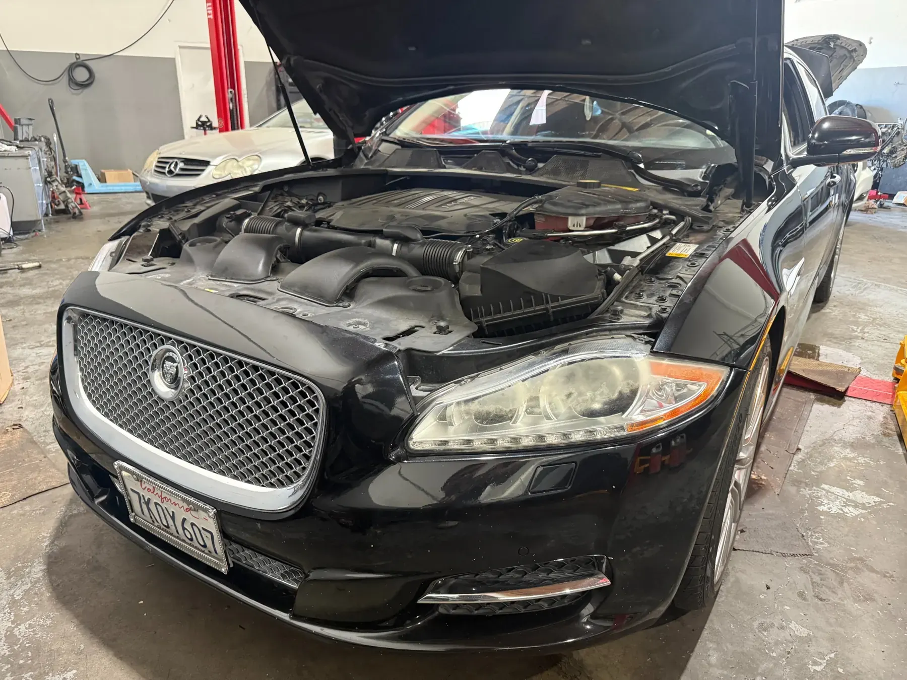 Jaguar sedan being serviced